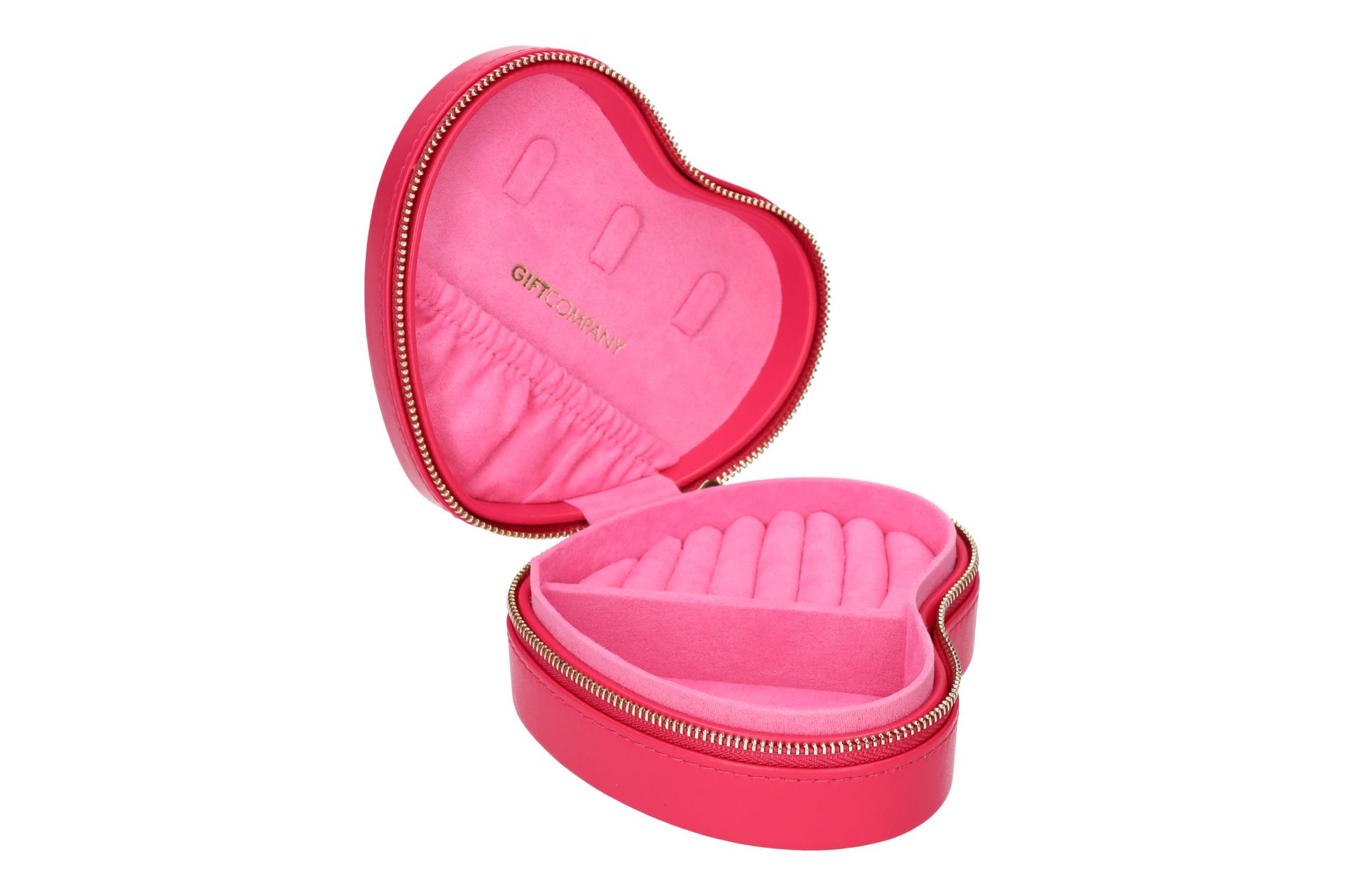 Zu sehen ist das Produkt 'Treasure, Schmucketui Herz, fuchsia'. Das Etui besitzt eine Herzform und eine auffällige Farbe in Fuchsia.