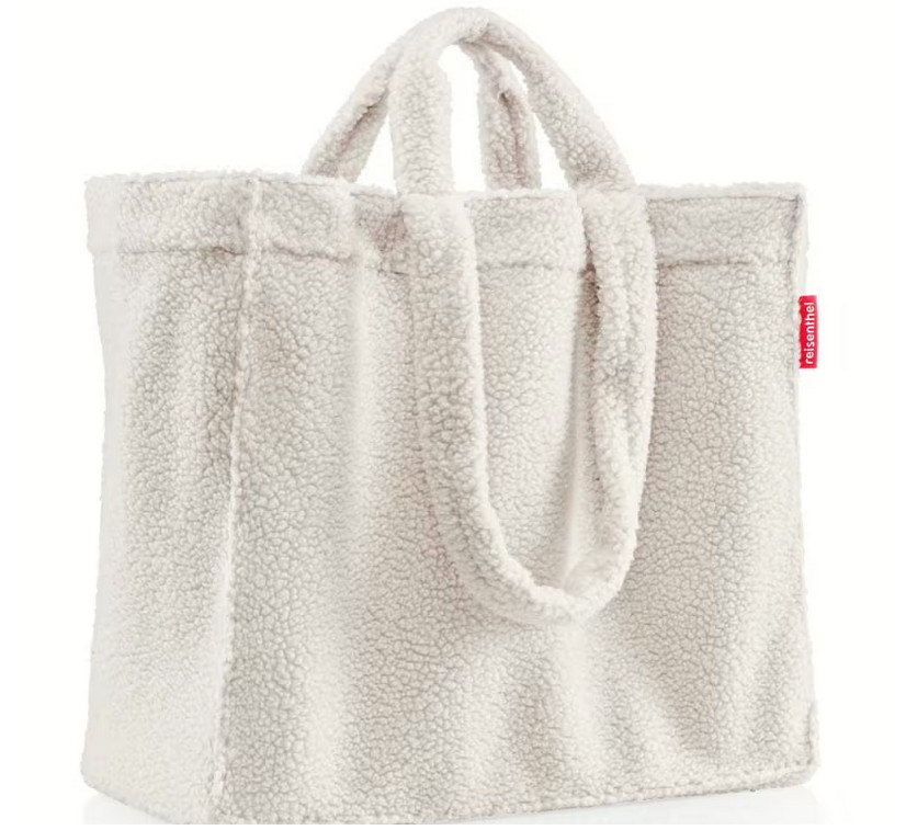 Abgebildet ist die Softshopper Teddy Sand Tasche. Diese hat eine weiche, sandfarbene Oberfläche.