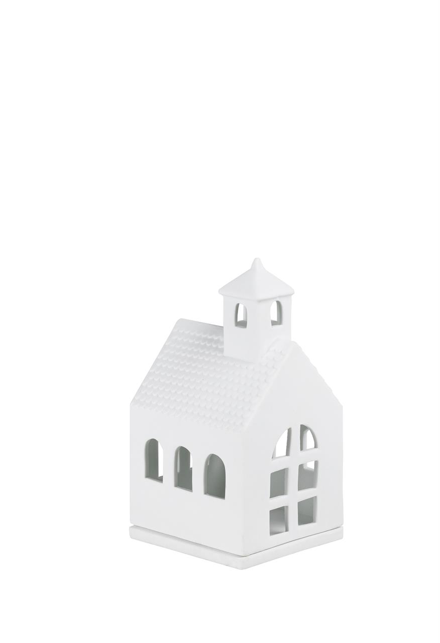 Das Bild zeigt ein kleines, weißes Lichthaus in Form einer Kapelle. Es hat Fenster und einen kleinen Turm auf dem Dach.