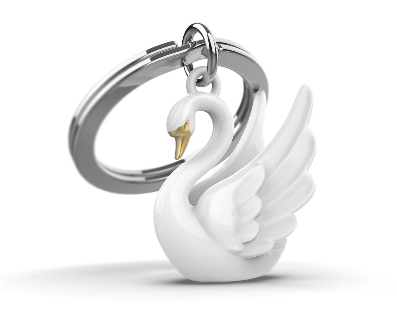 Auf dem Bild ist ein Schlüsselanhänger in Form eines weißen Schwans zu sehen. Der Schwan hat einen goldfarbenen Schnabel und ist an einem silbernen Schlüsselring befestigt.