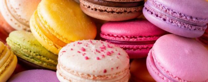 Das Bild trägt den Dateinamen '675x268 macaron_(1)'. Es zeigt vermutlich eine Abbildung von Macarons oder ein dazugehöriges Design.