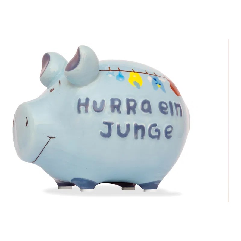 Das Bild zeigt ein blaues Sparschwein mit der Aufschrift "Hurra ein Junge". Auf dem Rücken des Sparschweins sind kleine bunte Kleidungsstücke an einer Wäscheleine gemalt.