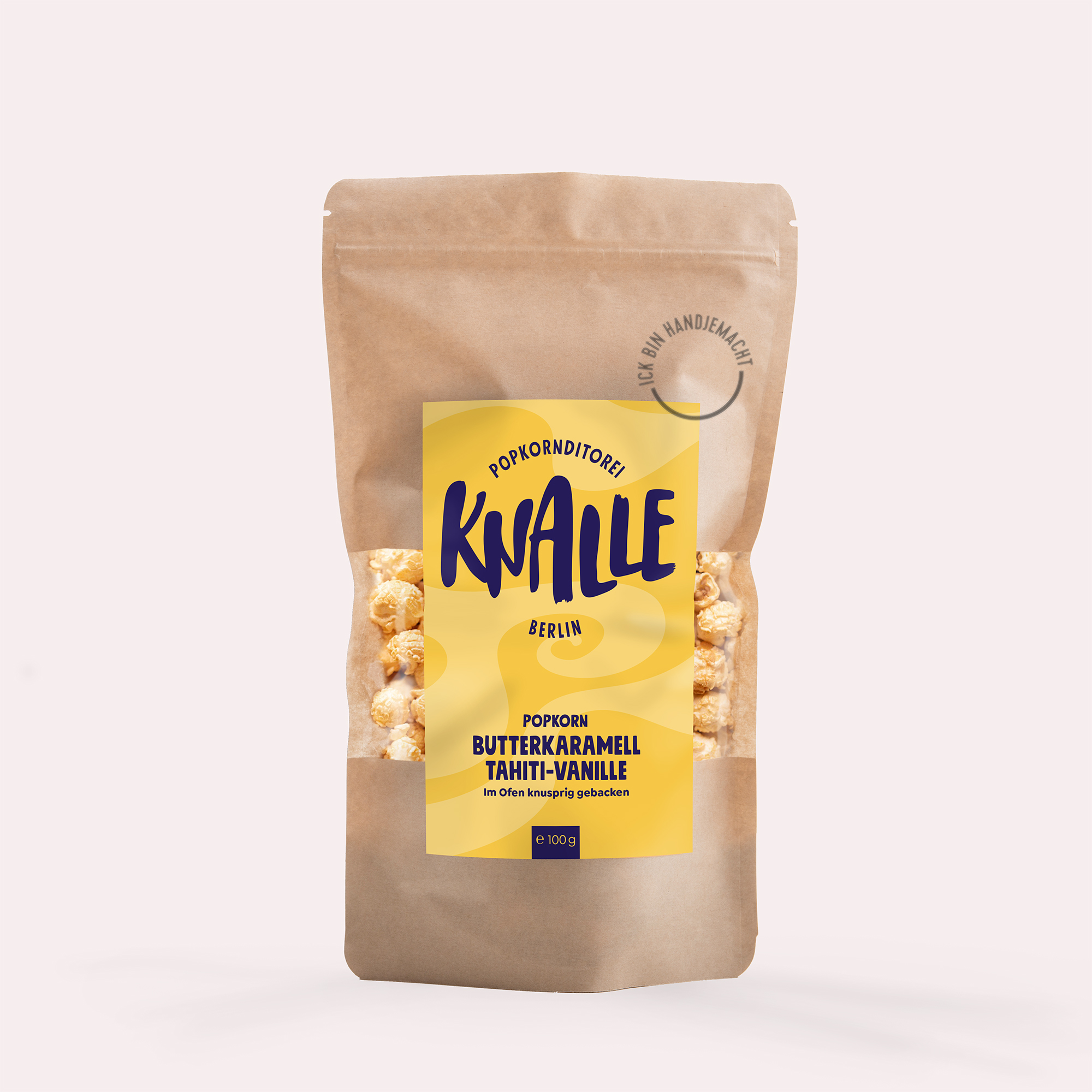 Das Bild präsentiert Knalle Butterk.Tahiti Vanille 100g. Es handelt sich um Popcorn mit Butterkaramell und Vanille-Geschmack.