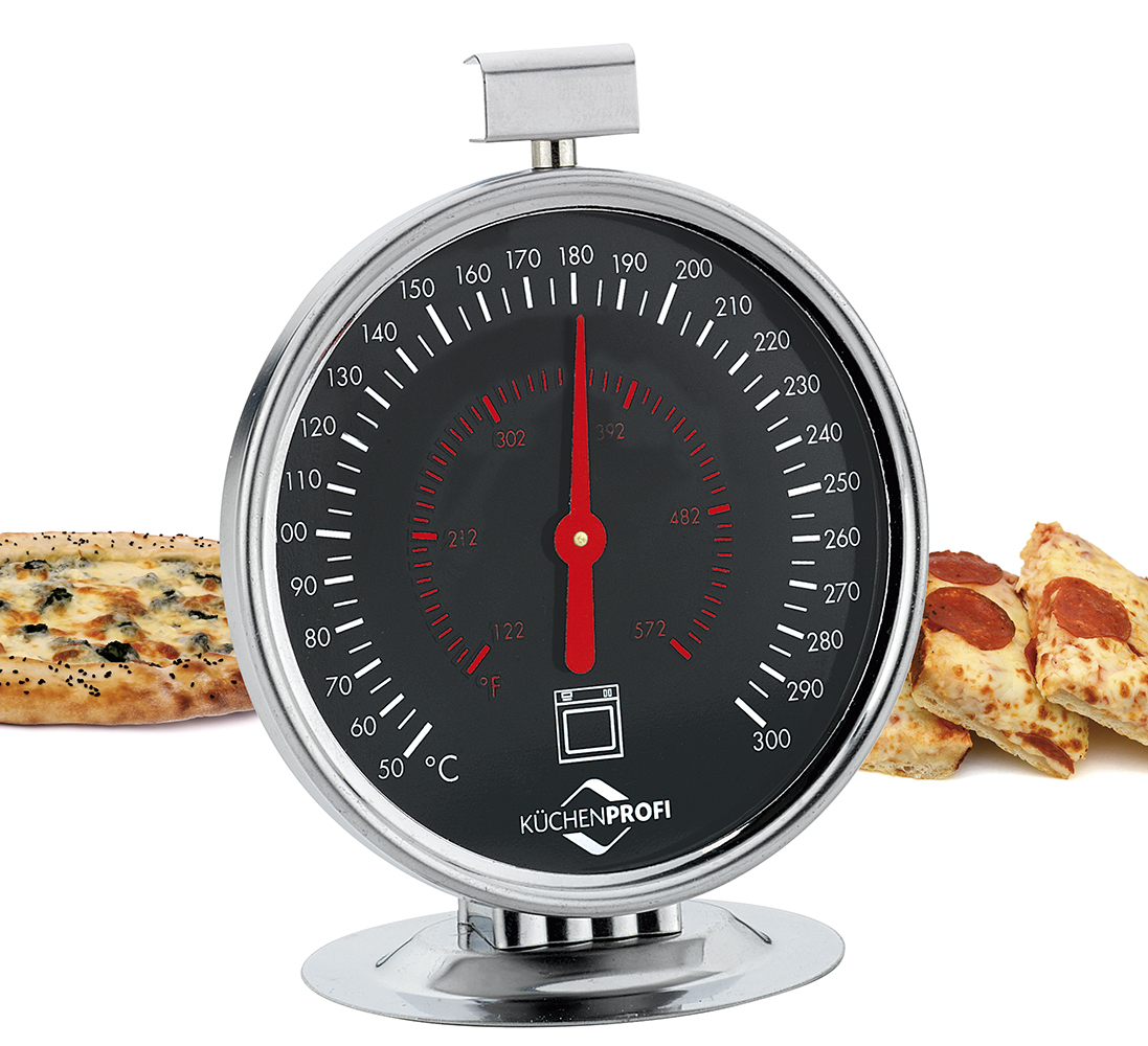 Auf dem Bild ist ein großer Ofenthermometer von Küchenprofi zu sehen. Im Hintergrund liegen zwei verschiedene Pizzen.