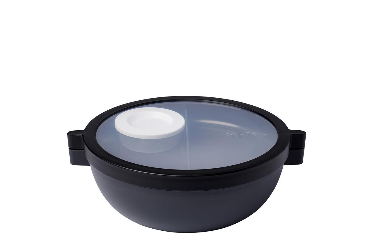 Dies ist die Bento Lunchbowl Vita in der Farbe Nordic Black. Sie hat eine runde Form mit einem transparenten Deckel und einem kleinen weißen Behälter im Inneren.