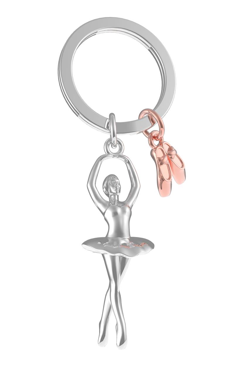 Der Schlüsselanhänger zeigt eine Ballerina in Chromoptik und kleine Ballettschuhe in Kupferfarbe. Er ist 9,6 x 3,5 x 2 cm groß.