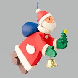 Die Figur zeigt einen schwebenden Weihnachtsmann mit rotem Mantel und weißem Bart. Er hält eine kleine Glocke und ein Tannenbäumchen in den Händen.