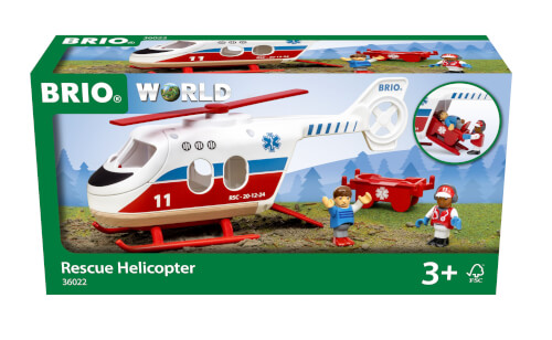 Auf dem Bild ist eine Spielzeug-Rettungshubschrauber-Set von BRIO zu sehen. Die Packung zeigt einen Hubschrauber, zwei Spielfiguren und eine Trage.