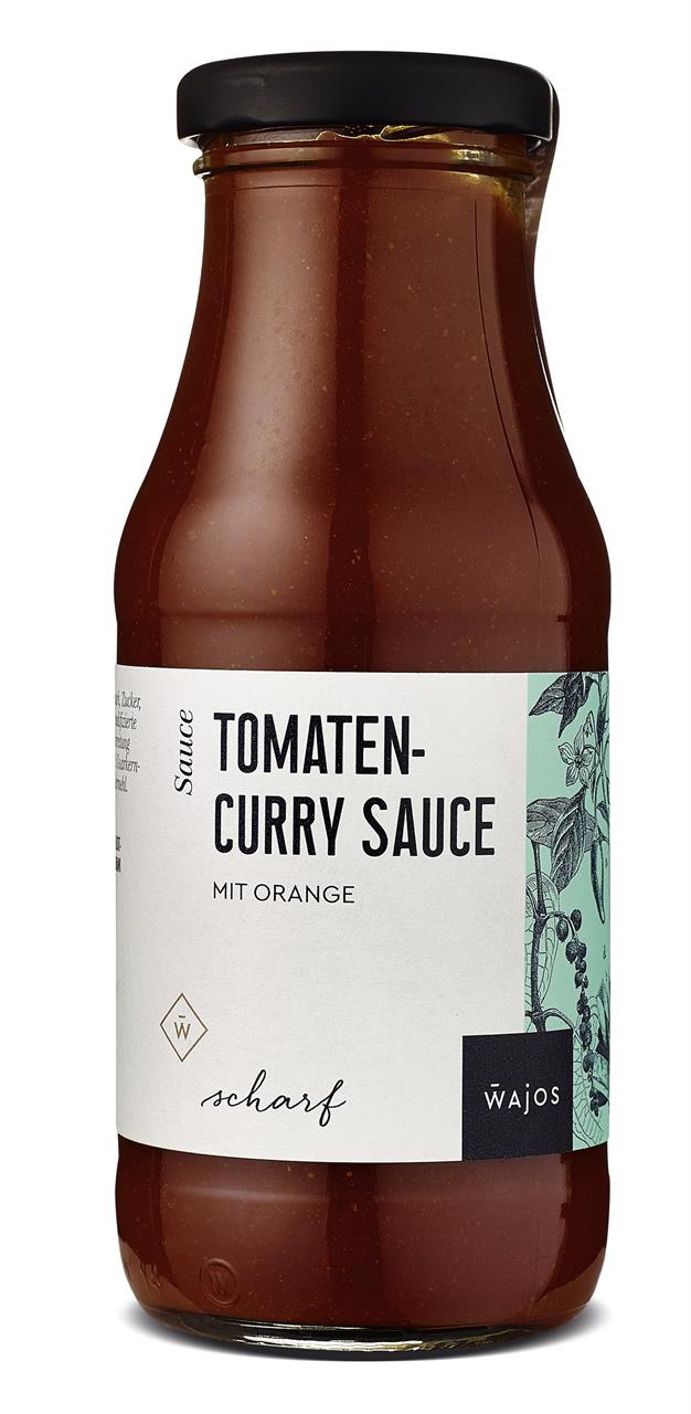 Das Bild zeigt eine Flasche Tomaten-Curry Sauce mit Orange von der Marke Wajos. Die Sauce ist scharf und die Flasche enthält 245 ml.