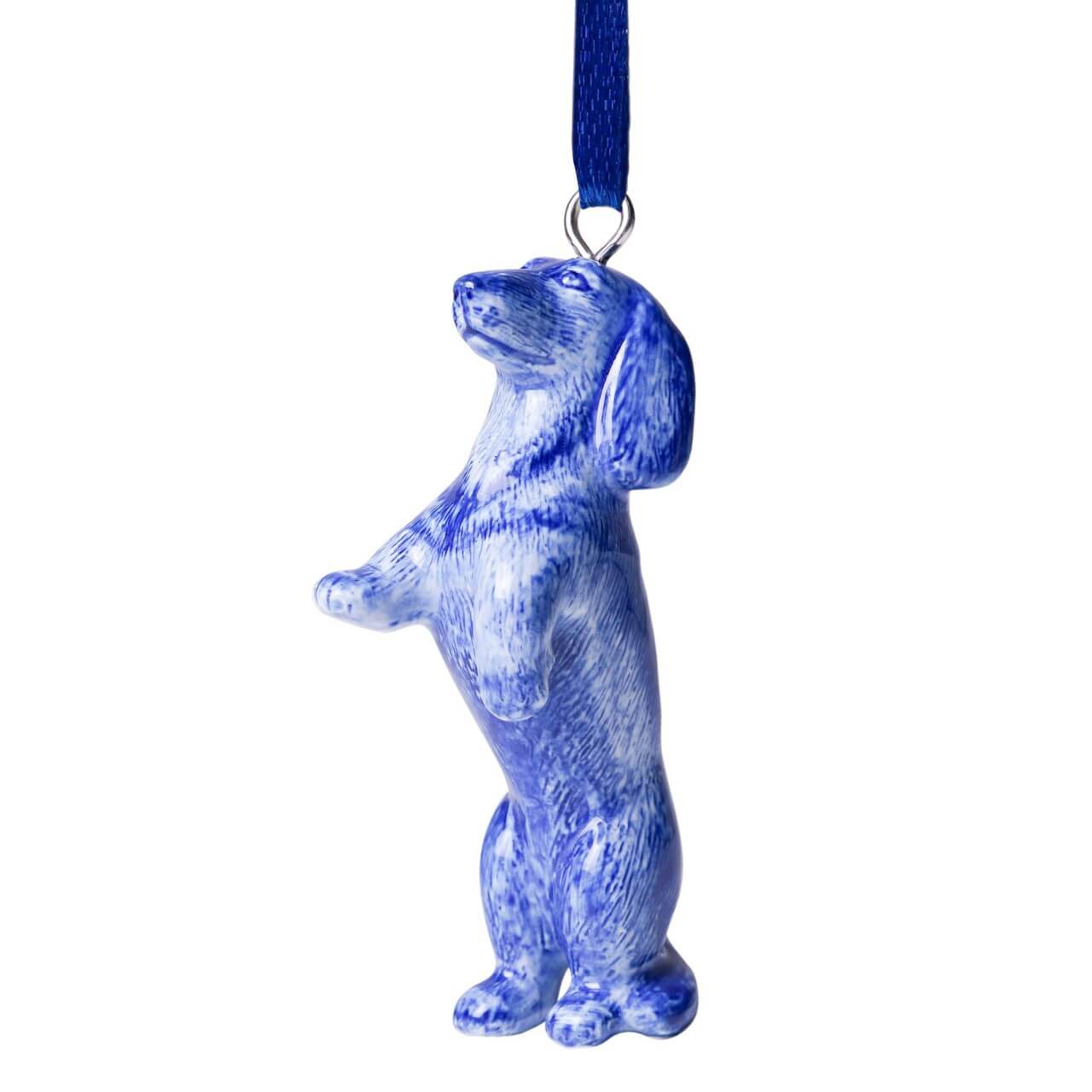 Weihnachtsanhänger in Form eines bettelnden Dackels. Ein niedliches Dekor für den Weihnachtsbaum.