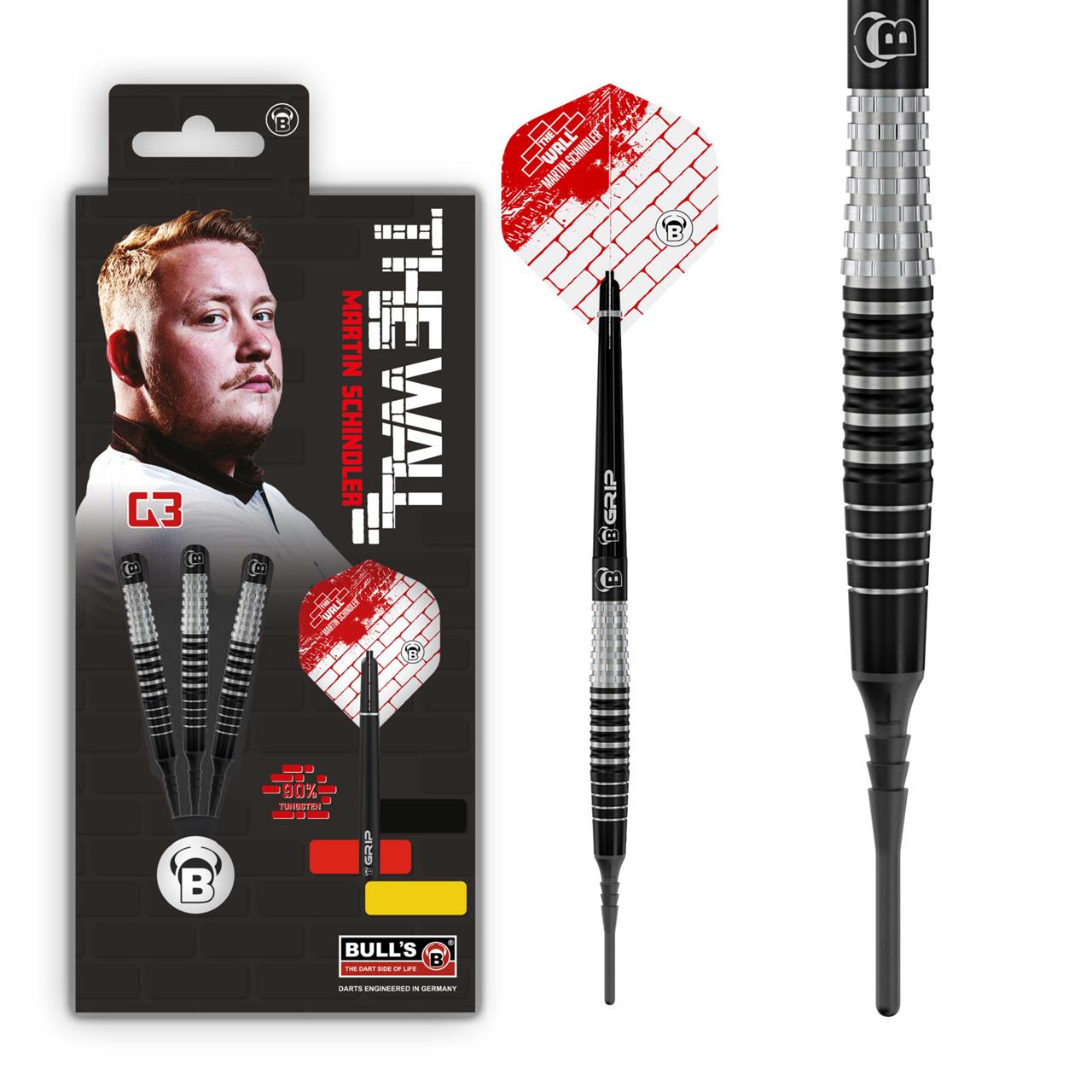 Das Bild zeigt das Produkt "BULL'S® Martin Schindler Generation 3 Softdart 18g" samt Verpackung und einem einzelnen Dartpfeil. Die Verpackung präsentiert das Bild eines Mannes sowie das markante Design des Dartpfeils mit rot-weißen Flights.
