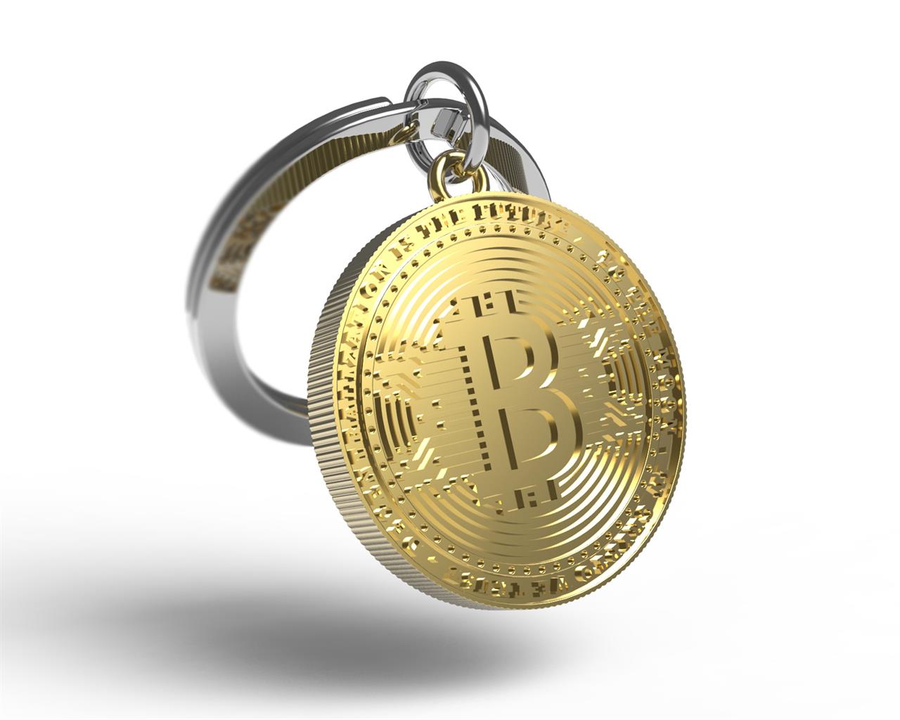 Der Schlüsselanhänger zeigt eine goldfarbene Bitcoin-Münze. Er hat einen silbernen Ring zum Befestigen von Schlüsseln.