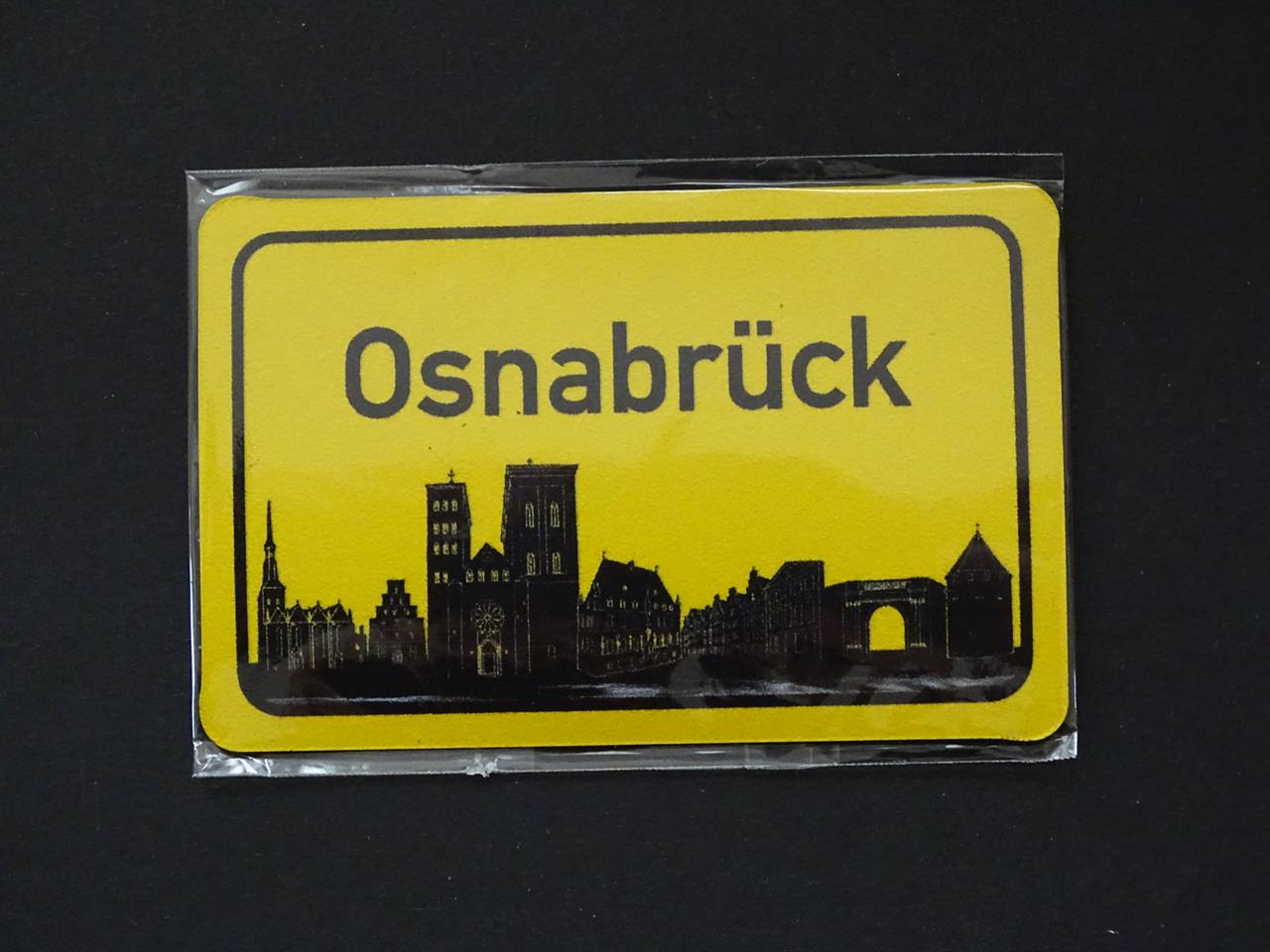 Das Bild zeigt einen gelben Magneten mit der Aufschrift "Osnabrück". Am unteren Rand ist die Skyline der Stadt Osnabrück in Schwarz dargestellt.
