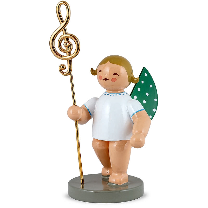 Abgebildet ist das Produkt 'Musikus Mit Echt Vergoldetem Notenschlüssel Notens'. Es zeigt eine Figur mit einem vergoldeten Notenschlüssel.