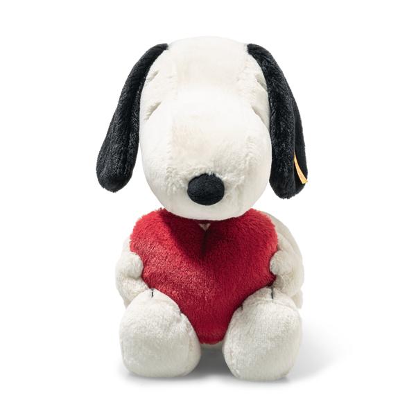 Das Bild zeigt ein weißes Snoopy-Plüschtier mit einer Höhe von 30 cm. Snoopy hält ein rotes Herz in seinen Pfoten.