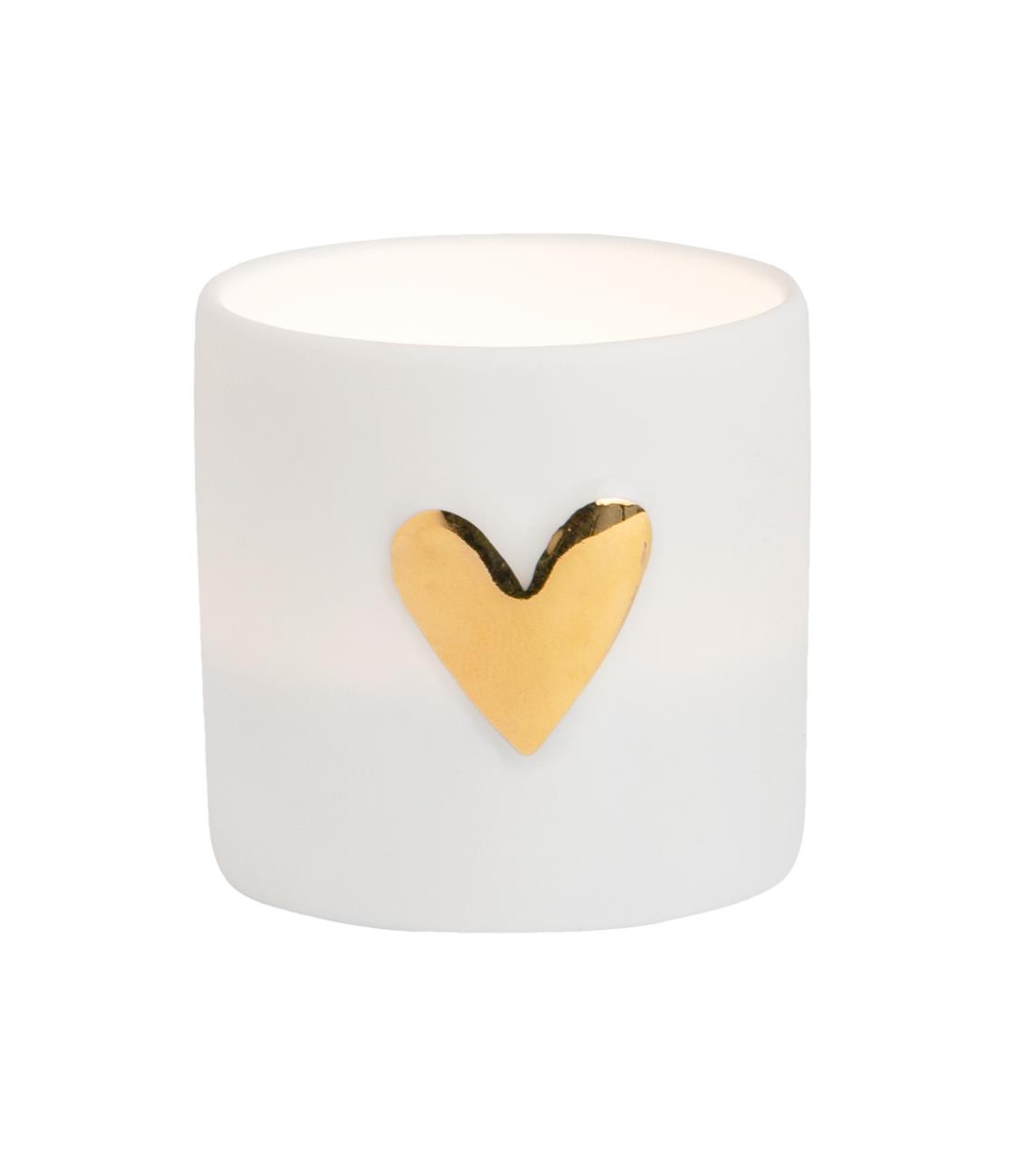 Das Bild zeigt ein weißes Teelichthalter mit einem goldenen Herz darauf. Das Produkt heißt "Lichter Herz 2er".