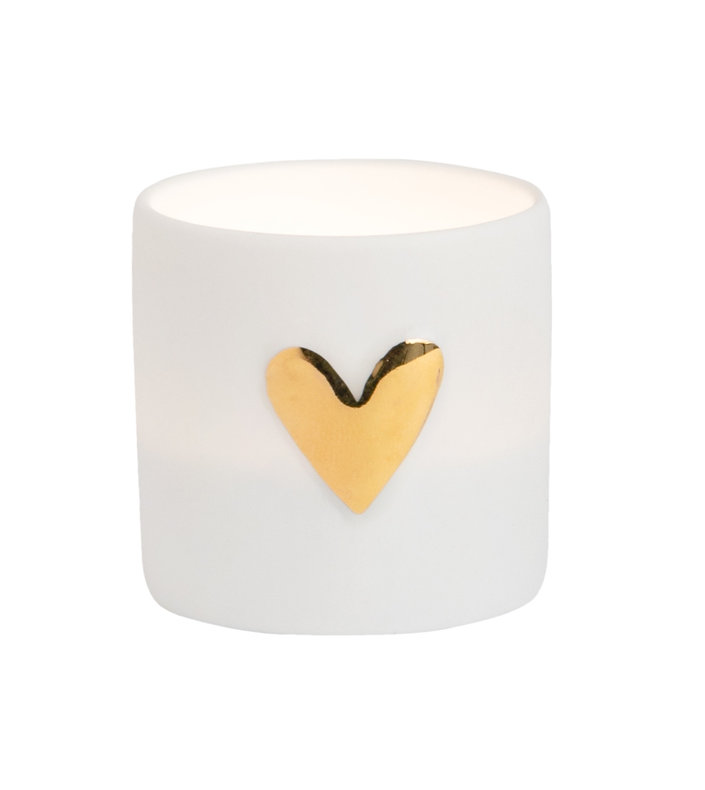 Das Bild zeigt ein weißes Windlicht mit einem goldenen Herz auf der Vorderseite. Das Produkt heißt "Lichter Herz 2er".