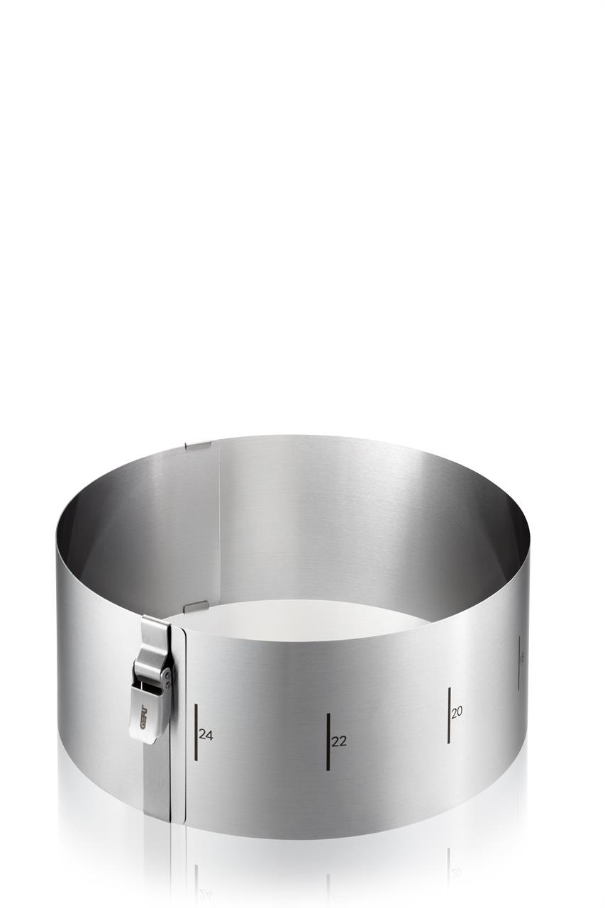 Auf dem Bild ist ein verstellbarer Tortenring aus Edelstahl mit einer Höhe von 10 cm zu sehen. Er trägt die Bezeichnung "Tortenring TONDO CLIP" und zeigt Markierungen für verschiedene Durchmesser.