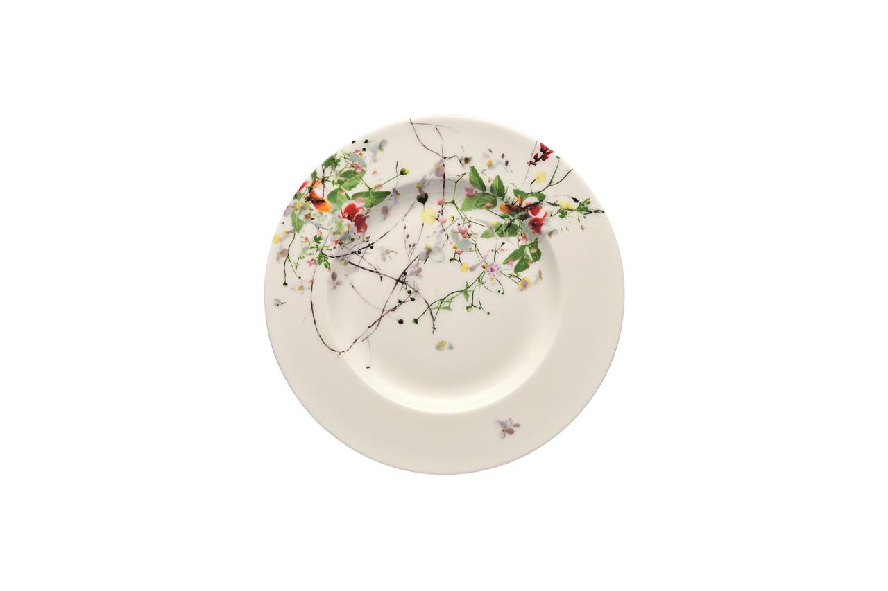 Der Frühstücksteller ist 19 cm groß und gehört zur Serie Brillance / Fleurs Sauvages. Er ist weiß und mit bunten Wildblumen dekoriert.