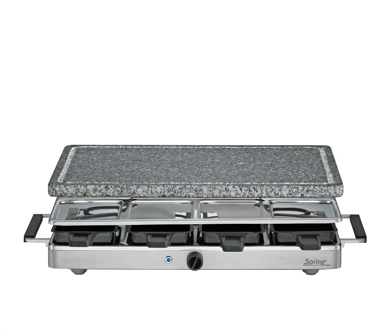 Das Bild zeigt ein Raclette-Gerät mit einer großen Granitsteinplatte. Das Gerät verfügt über mehrere kleine Pfännchen zum individuellen Zubereiten von Speisen.
