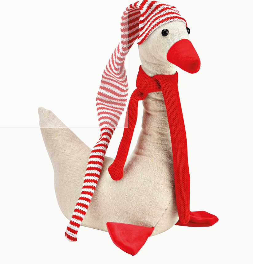 Weihnachtsgans aus Textil ist in den Farben Rot, Weiß und Beige gestaltet. Sie ist eine dekorative Weihnachtsfigur.