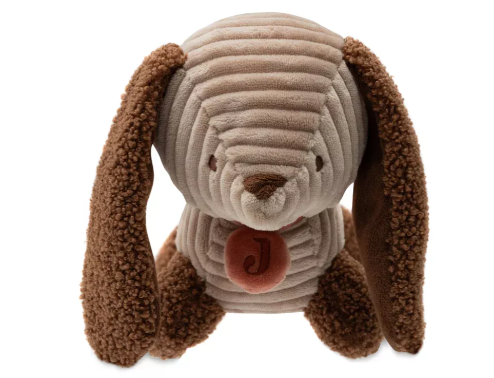 Hier ist das Kuscheltier Diego Dog. Es ist weich und eignet sich perfekt zum Kuscheln.