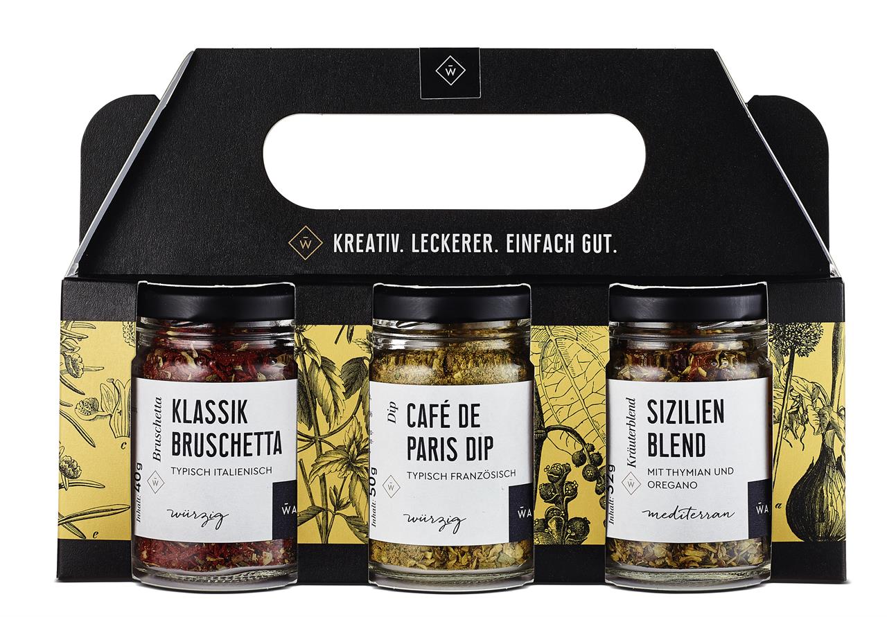 Das Bild zeigt ein Kräuter-Set mit drei verschiedenen Gewürzmischungen in Gläsern. Die Sorten sind Klassik Bruschetta, Café de Paris Dip und Sizilien Blend.