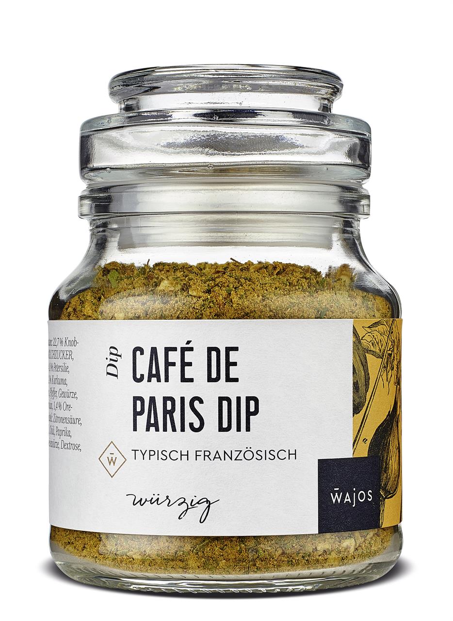 Das Bild zeigt ein Glas mit der Aufschrift "Café de Paris Dip – Typisch Französisch". Es handelt sich um eine 95g Gewürzmischung von der Marke Wajos.