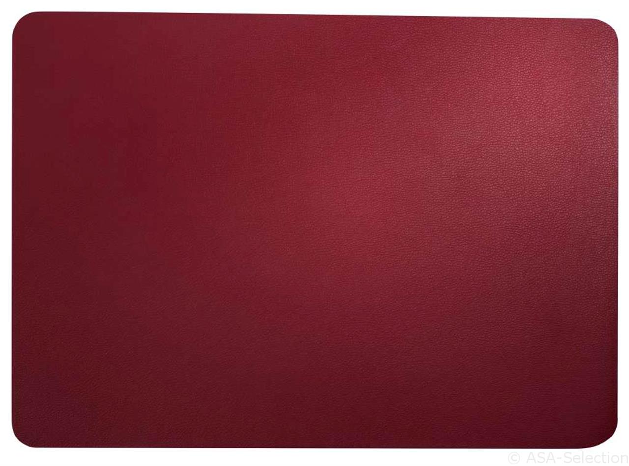 Das Bild zeigt ein rechteckiges Platzset in Lederoptik in der Farbe Magnolie. Das Tischset misst 33 x 46 cm und hat abgerundete Ecken.