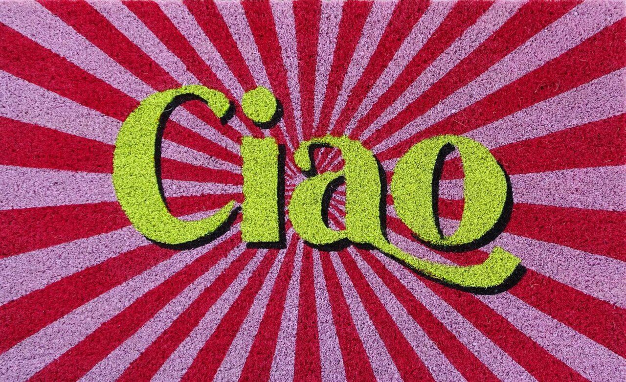 Fussmatte mit dem Motiv 'Ciao' in den Farben Rosa, Pink und Gelb. Diese Matte bringt Farbe und einen freundlichen Gruß in den Eingangsbereich.